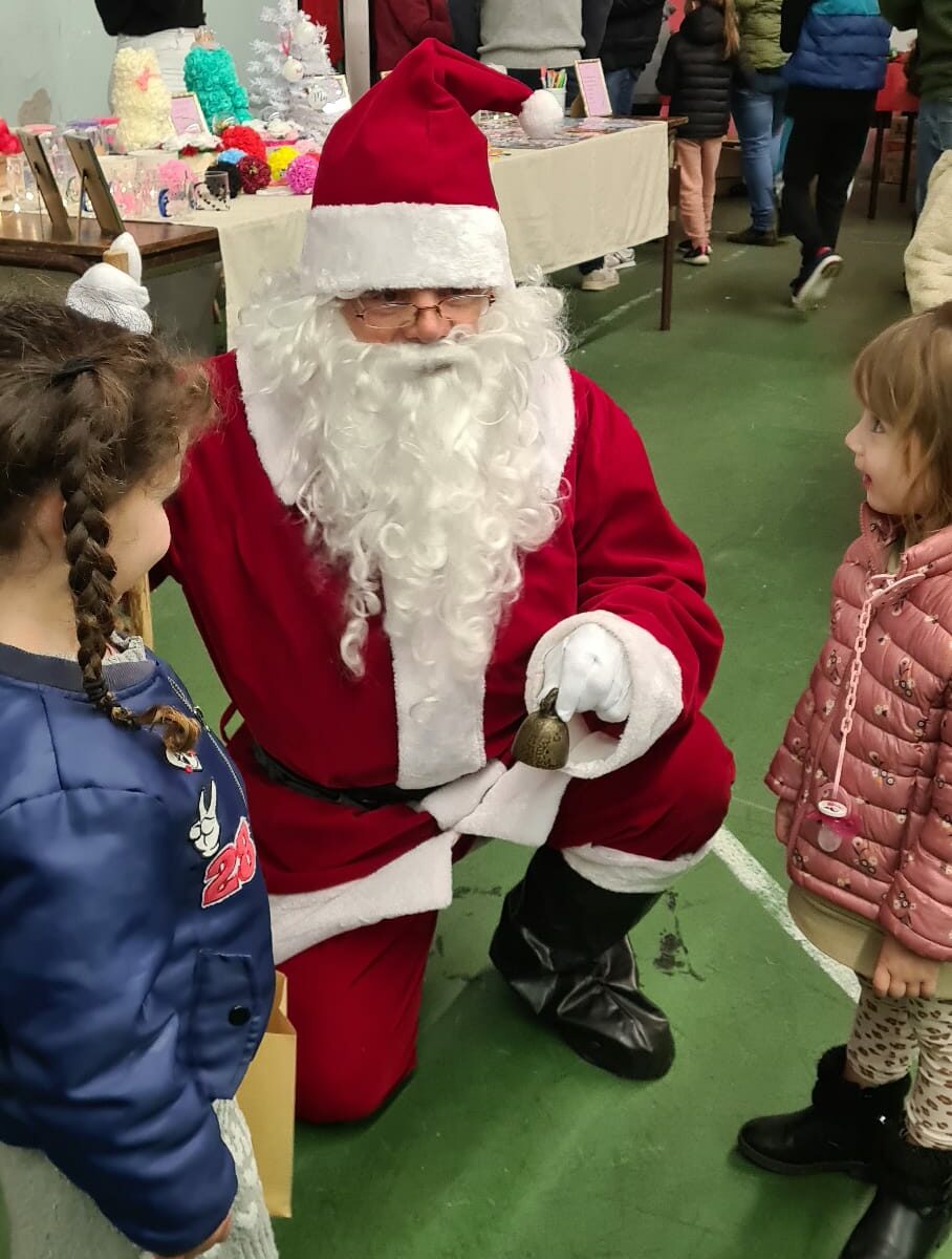 Visite du Père Noël, distribution cadeaux, photos