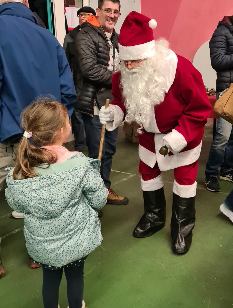 Visite du Père Noël, distribution cadeaux, photos