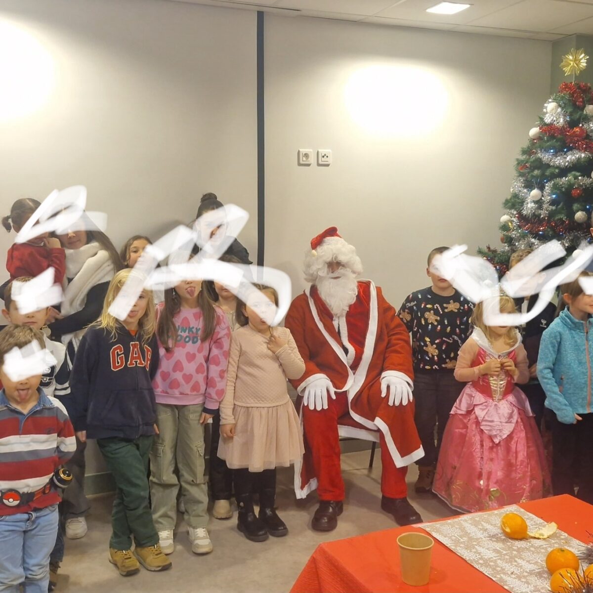 Visite père Noël et sculpture en ballons